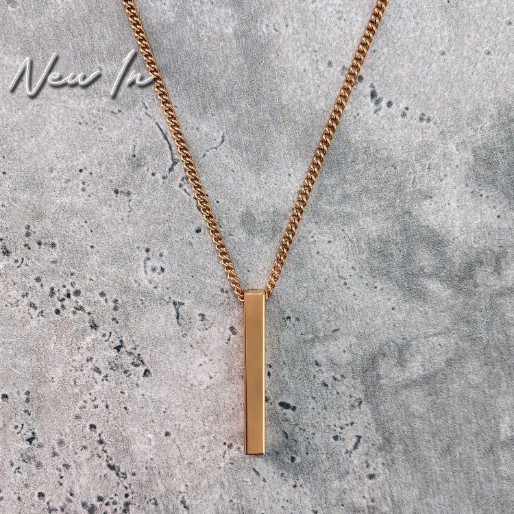 Gold Bar Necklace - Our 24KT Gold Plated Minimal Bar Necklace features our Signature Bar Pendant and Cuban Link Chain. The Perfect piece for any wardrobe.